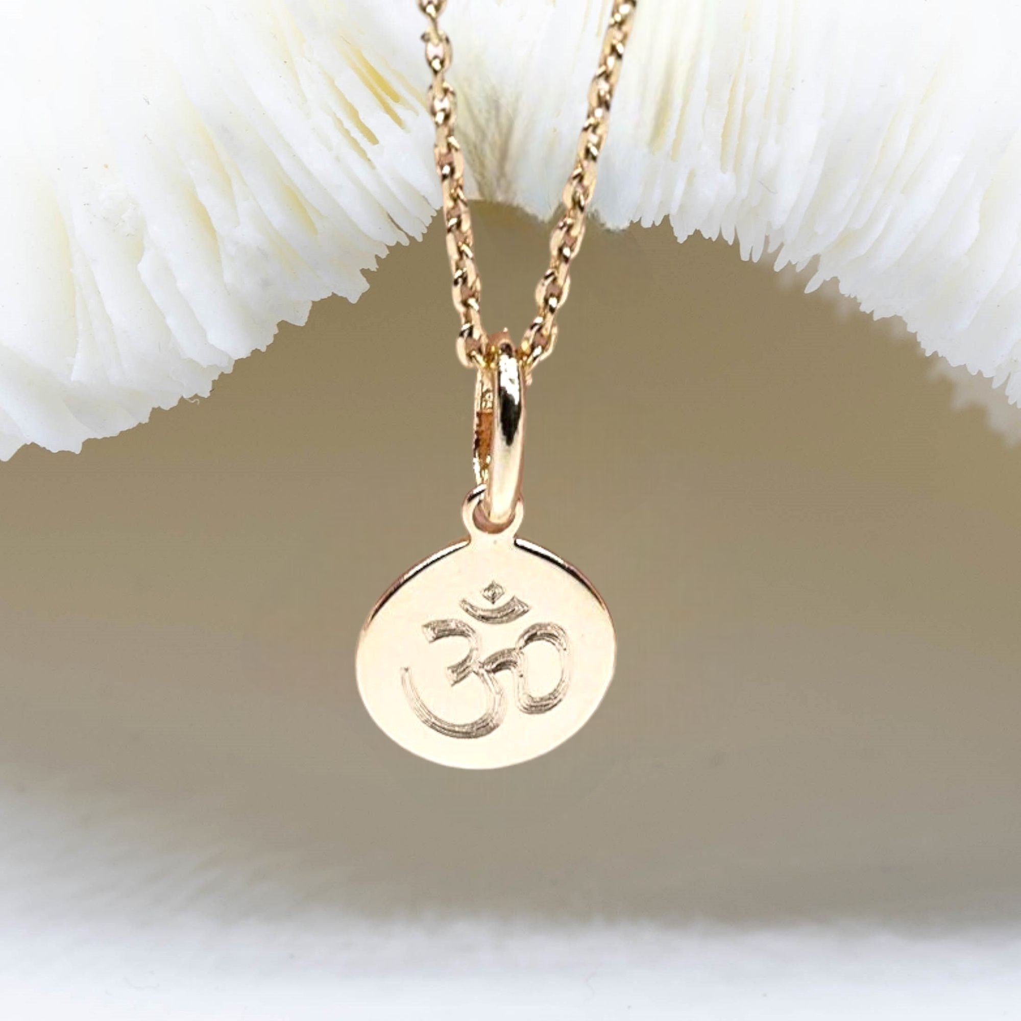 collier om symbole