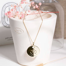 collier symbole OM